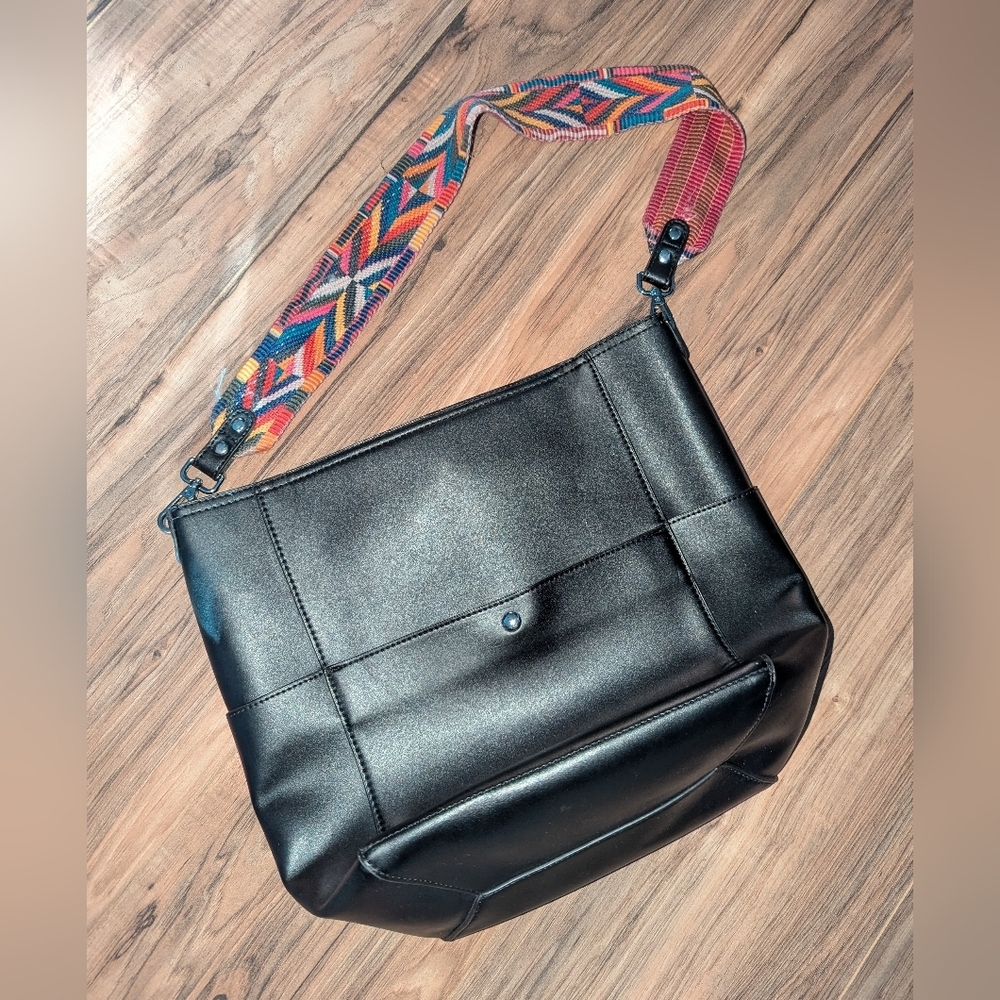 Black leather Bromen back with boho style shoulder strap.